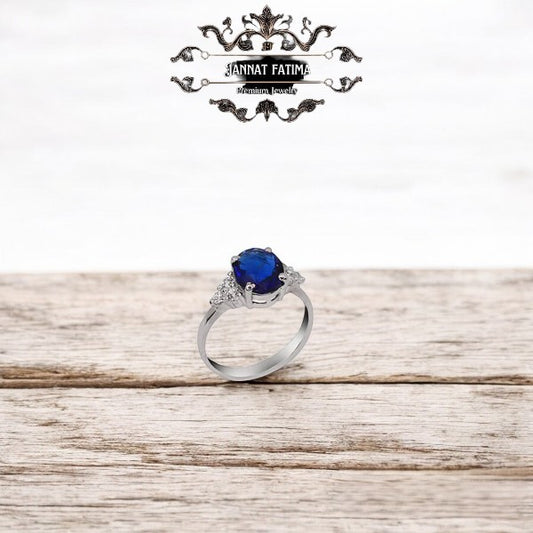 Silver Ring with Blue Gem